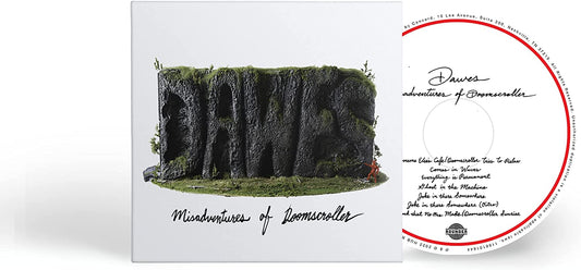 "Album cover featuring a cliff with arches and a small figure, titled 'Misadventures of Doomscroller'."