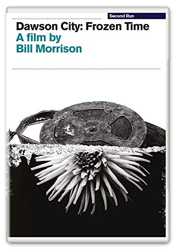DVD cover for "Dawson City: Frozen Time" featuring a vintage camera and flower.