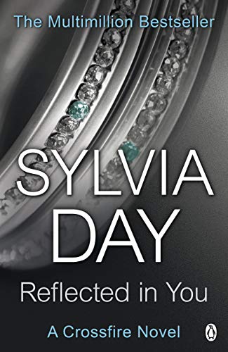 Book cover: “Reflected in You” by Sylvia Day, with jewelry imagery.