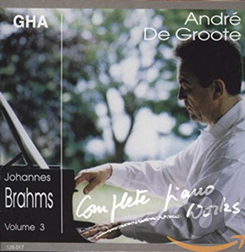 CD cover featuring pianist André De Groote with sheet music.