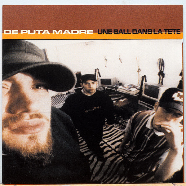 CD cover with three men wearing caps, studio background.