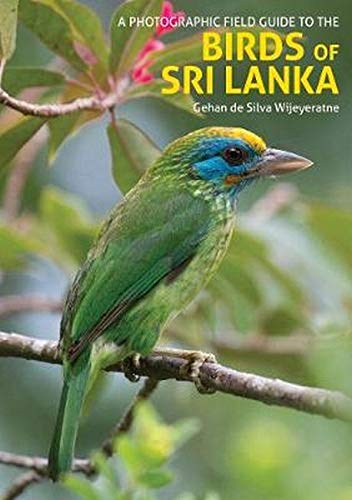 Book cover featuring a yellow-crowned, green-feathered barbet perched on a branch.