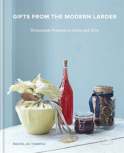 Book cover with homemade gifts: bottled drinks, jam, and dried fruit.