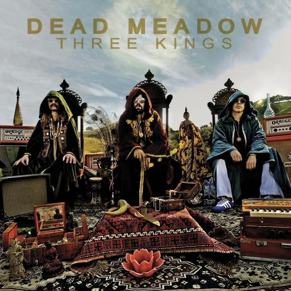 Album cover for Dead Meadow’s “Three Kings” featuring three figures and ornate details.