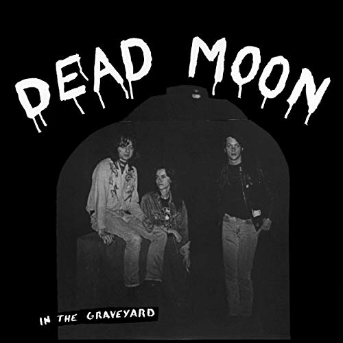 Black and white album cover featuring three people in an archway.