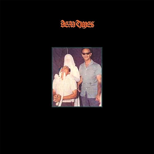 Black album cover with a vintage photo of two figures.