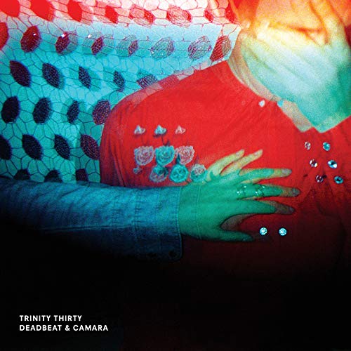 Abstract, colorful double-exposure photograph of a person in a red shirt with hands.