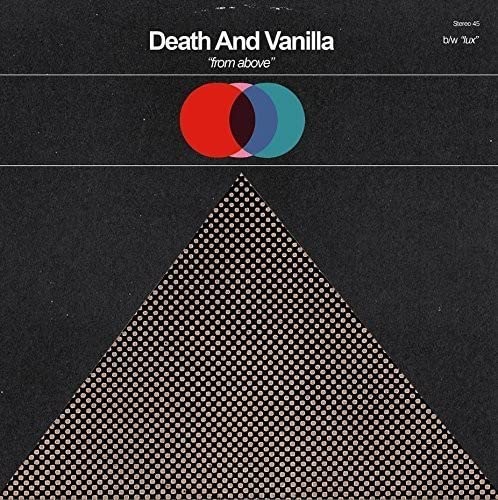 Vinyl record cover with overlapping circles and a dotted triangle.