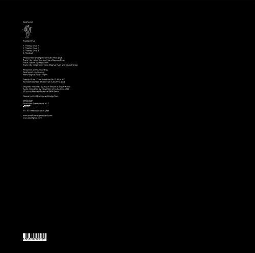 Black vinyl record back cover with white tracklist and barcode.
