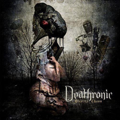Dark, surreal album cover with robotic and human figure in a barren landscape.