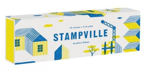 Rectangular Stampville box with blue and yellow illustrations of buildings and a construction crane.
