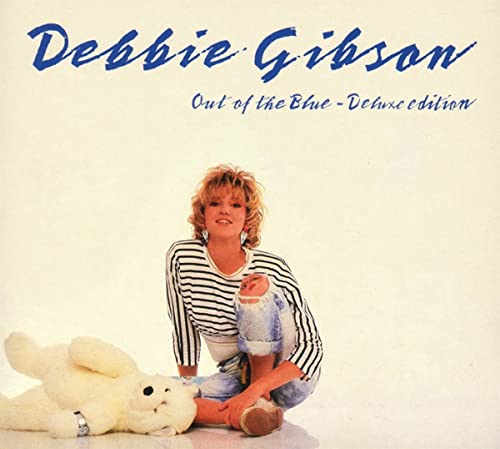 Debbie Gibson album cover: portrait with a teddy bear, blue text.