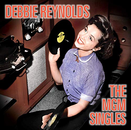 Debbie Reynolds holding vinyl records in a recording studio, with text overlay on the image.