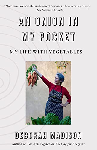 Book cover: woman holding carrots, surrounded by leafy greens, titled “An Onion in My Pocket.”