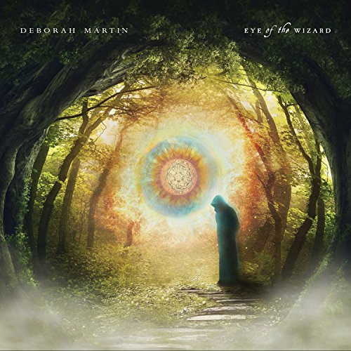 CD cover: hooded figure facing a glowing, circular light in a forest.