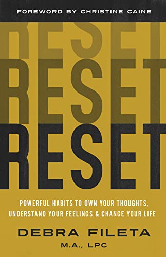 Yellow book cover with stacked, dark text reading "RESET" and author's name.