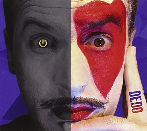 Close-up of a man with split-tone face paint and the word "Dedo".