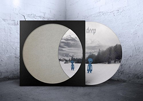 Vinyl record with a picture disc featuring aliens in a snowy landscape.
