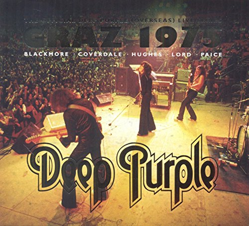 Deep Purple performing live on stage with a large crowd, 1975.