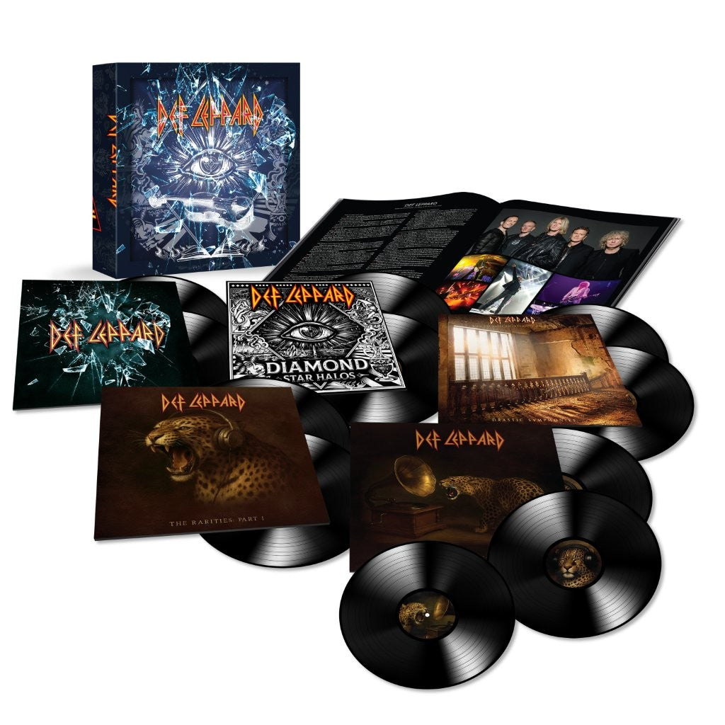 Def Leppard vinyl box set with albums, booklet, and black records.