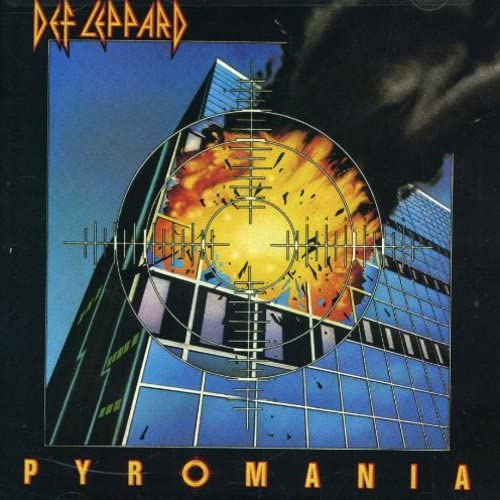Def Leppard’s “Pyromania” album cover: fiery explosion over a city skyline.