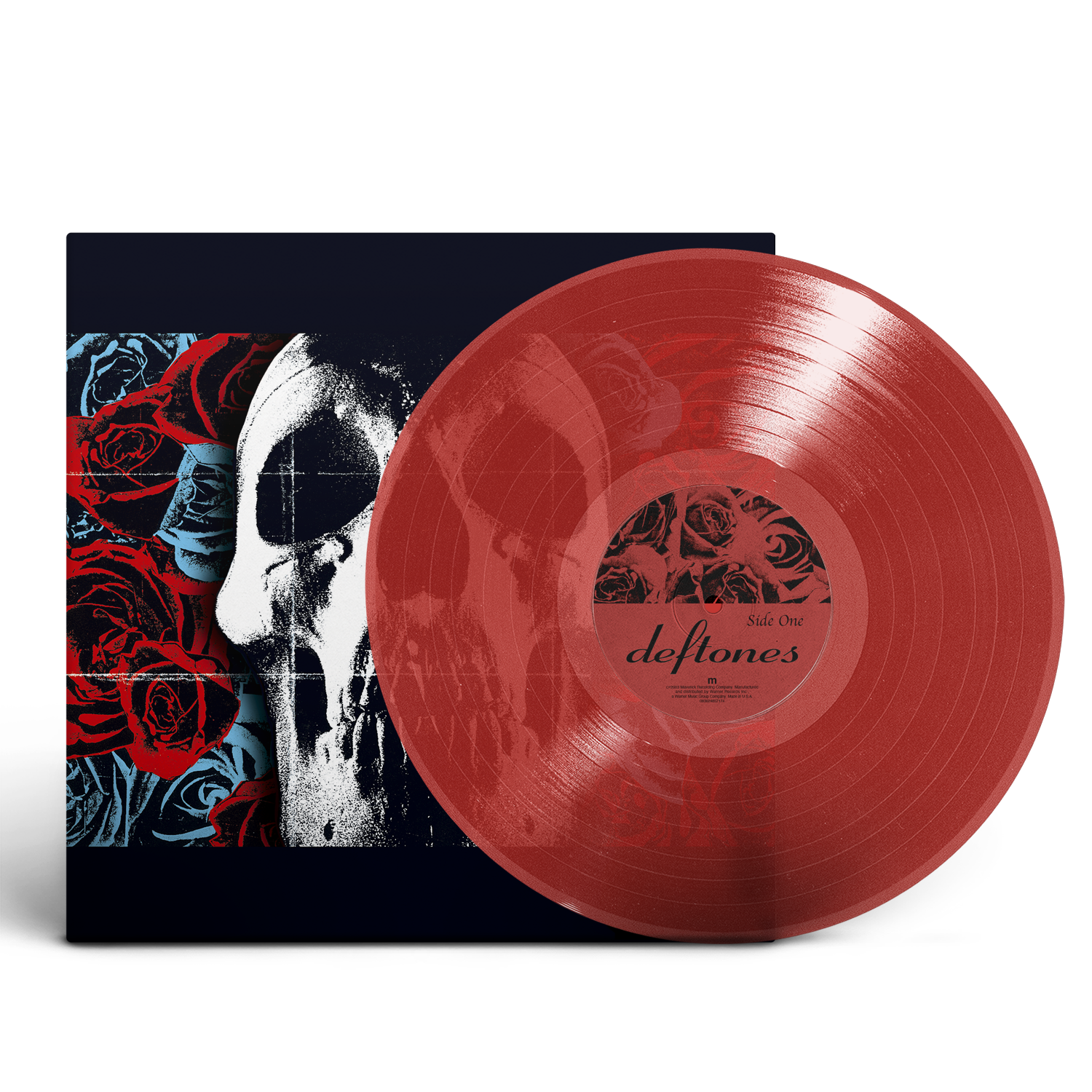 Red vinyl record and album cover with a skull and roses design.