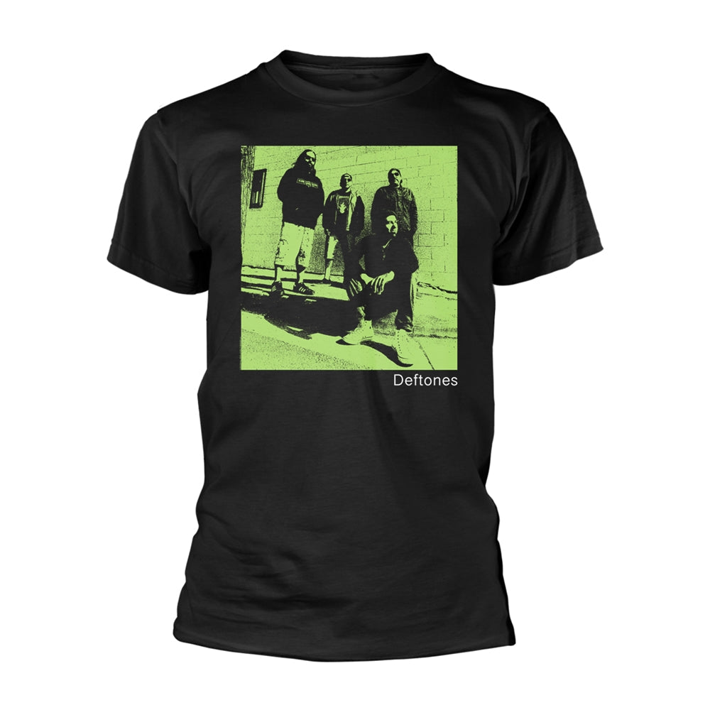 Black t-shirt with a faded green image of the band Deftones.