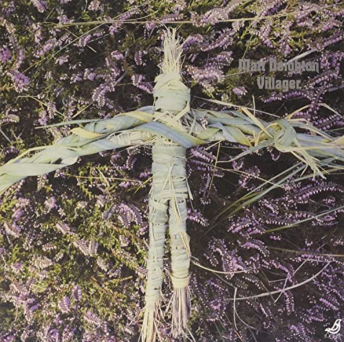 Album cover for “Villager” by Matt Deighton, featuring a straw figure.