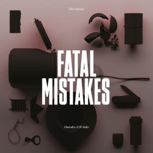 Del Amitri “Fatal Mistakes” CD cover with scattered, dark objects.
