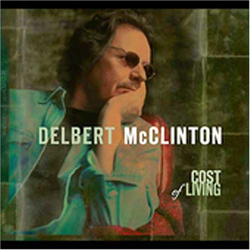 "CD case back cover with man holding face and track list."