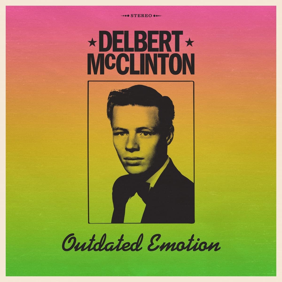 "Album cover with a black-and-white portrait of Delbert McClinton on a rainbow background."