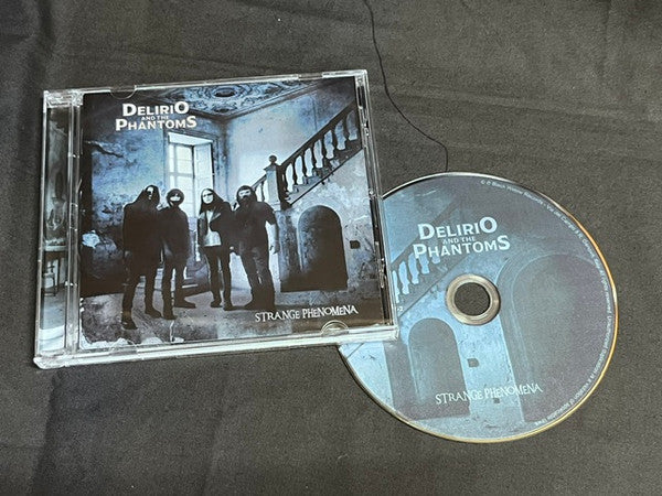 CD case for "Delirio And The Phantoms - Strange Phenomena" with figures.