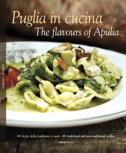 Cookbook cover titled Puglia in Cucina featuring a plate of orecchiette pasta with greens.