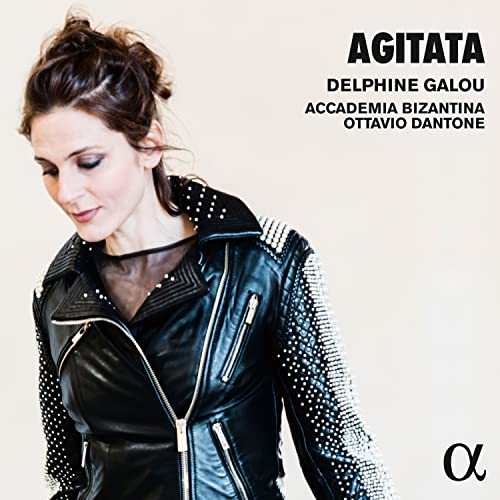 CD cover featuring Delphine Galou in a leather jacket, looking down.