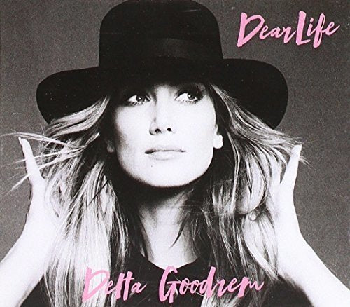 Delta Goodrem album cover, black and white portrait with pink text.