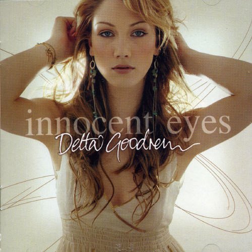 Album cover of Delta Goodrem's Innocent Eyes featuring a portrait of the artist.