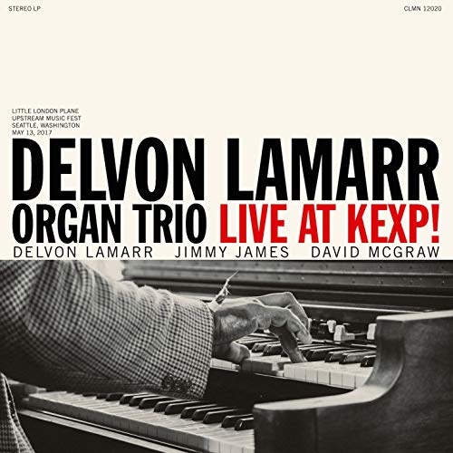 Album cover for Delvon Lamarr Organ Trio Live at KEXP showing someone playing organ.