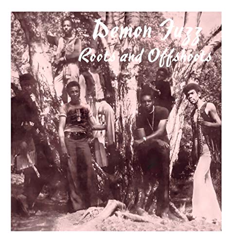 Sepia-toned album cover featuring a group of people in a wooded area.