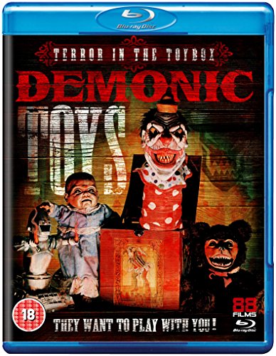 Blu-ray cover for Demonic Toys featuring a creepy clown, doll, and bear on wood.