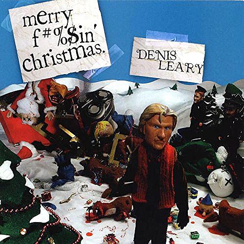 Claymation figure of Denis Leary in a chaotic, snowy Christmas scene with taped text.