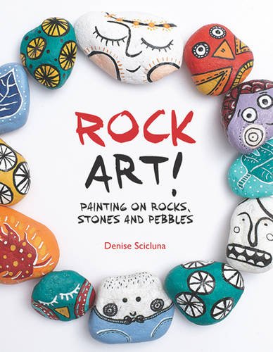 Painted rocks arranged around the book cover "Rock Art!" with colorful designs.
