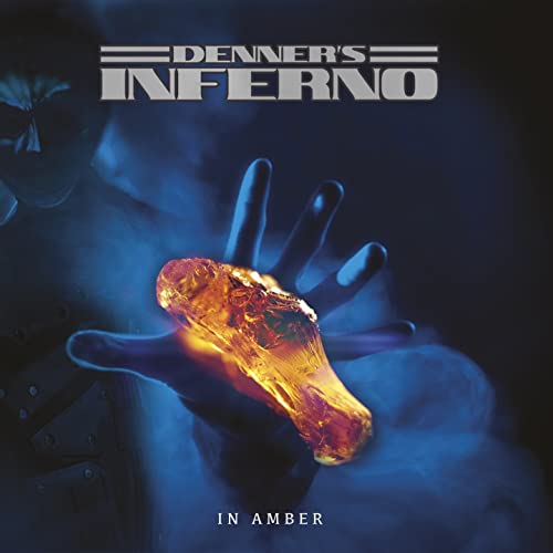 Album cover for Denner’s Inferno “In Amber” featuring a hand holding amber.