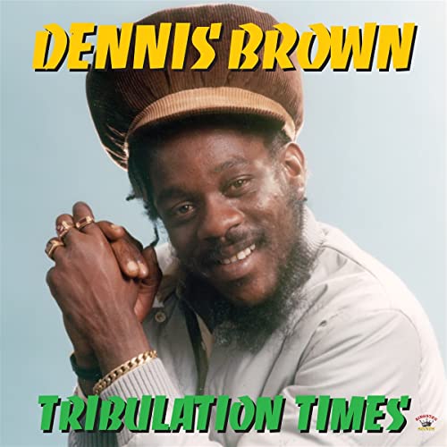 Dennis Brown portrait with text “Dennis Brown” and “Tribulation Times”.