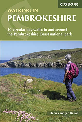 Book cover depicting a hiker overlooking a coastal landscape in Pembrokeshire.