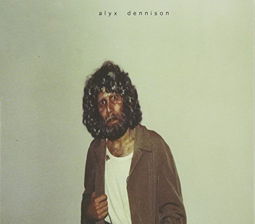 CD cover featuring a portrait of a man with long, dark hair and beard.