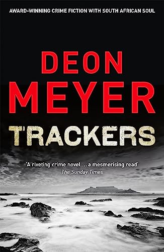 Book cover for “Trackers” by Deon Meyer with a coastal scene.
