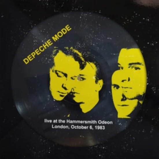 Depeche Mode vinyl record label with yellow portraits of two men.
