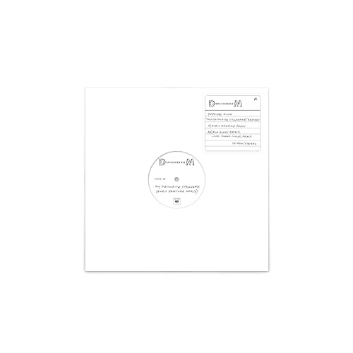 Depeche Mode vinyl record with white label and circular design.
