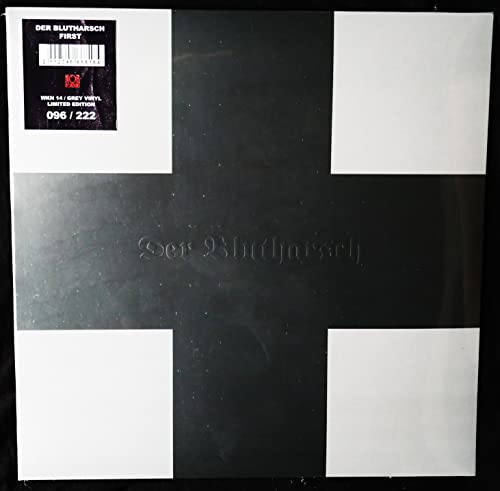 Grey vinyl record with a white and black cross design and sticker.