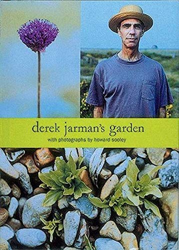 Book cover showing a purple flower, Derek Jarman in a hat, and beach pebbles.